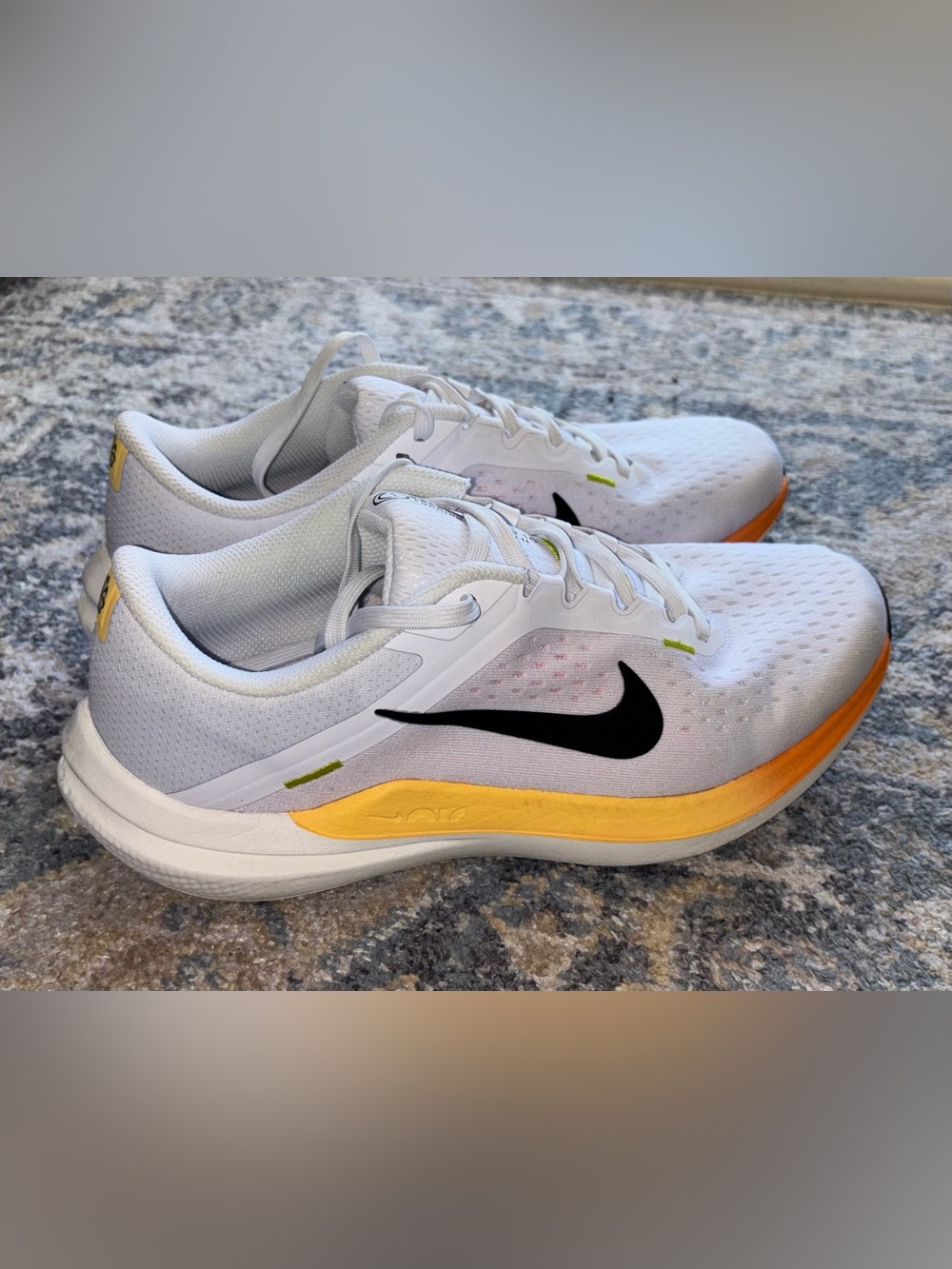 Nike Women’s White Sneakers with Black Swoosh and Yellow Accent